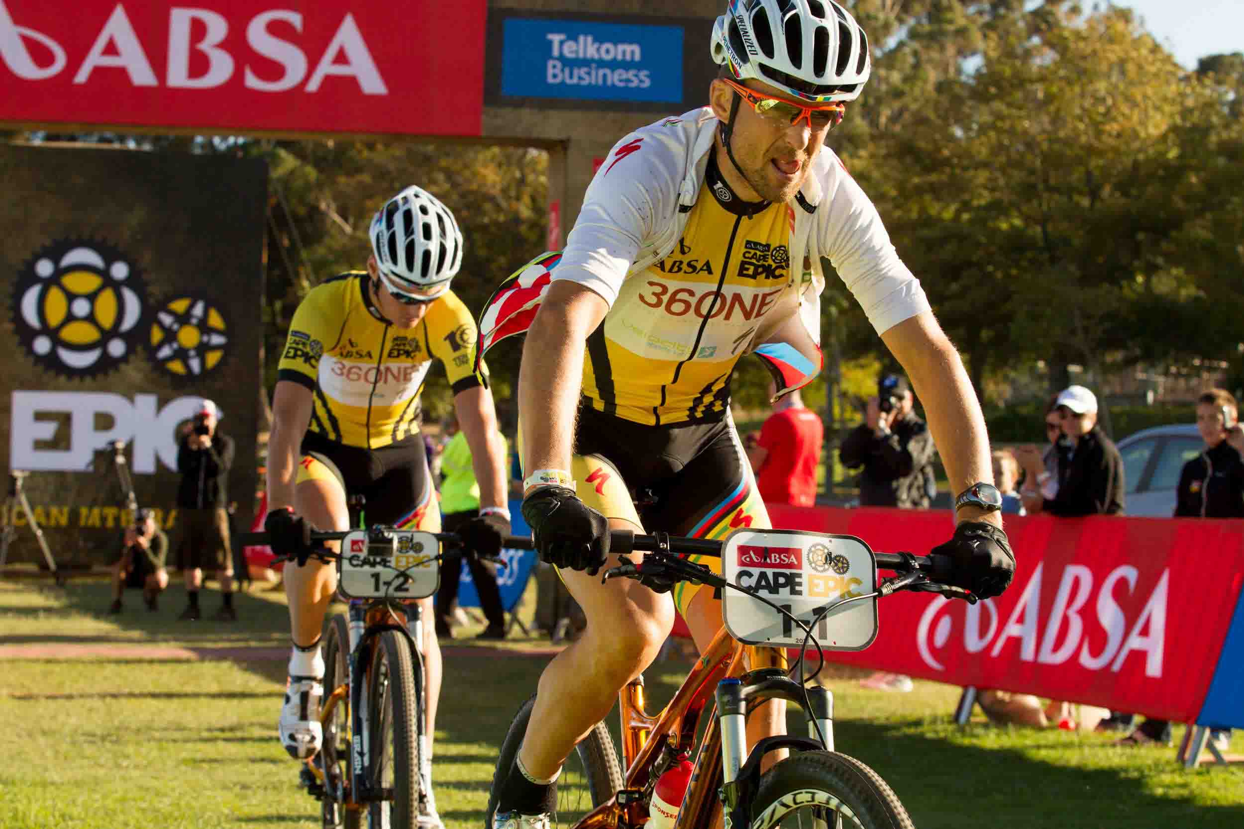 Christoph Sauser and Jaroslav Kulhavy of team Burry Stander-SONGO approach the finla start line cool and calm during the final stage (stage 7) of the 2013 Absa Cape Epic Mountain Bike stage race from Stellenbosch to Lourensford Wine Estate in Somerset West, South Africa on the 24 March 2013. Photo: Greg Beadle/Cape Epic/SPORTZPICS