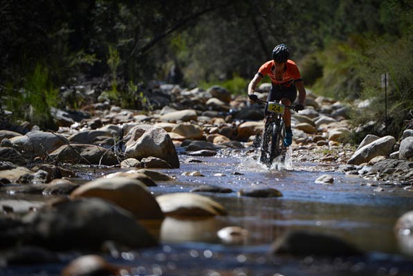 Timothy Hammond crosses a river at the 2016 Fairview Attakwas Extreme Mountain Bike Challenge in South Africa on Saturday. Photo: www.zooncronje.com