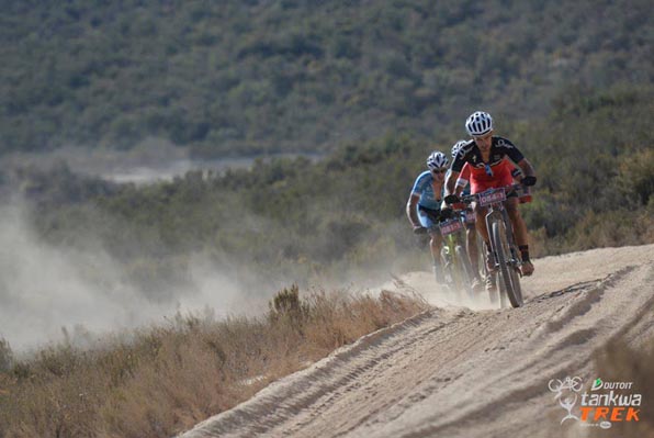 South African James Reid of Team Spur Specialized leads a group of riders through a sandy section during Stage 2 of the DUTOIT Tankwa Trek international mountain bike stage race in South Africa on Saturday. Photo: www.zooncronje.com