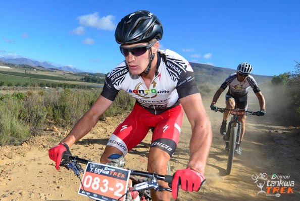 New Zealand's Sam Gaze leads his Investec-Songo-Specialized teammate, Switzerland's Christoph Sauser, during Stage 3 of the DUTOIT Tankwa Trek international mountain bike stage race in South Africa on Sunday. Photo: www.zooncronje.com