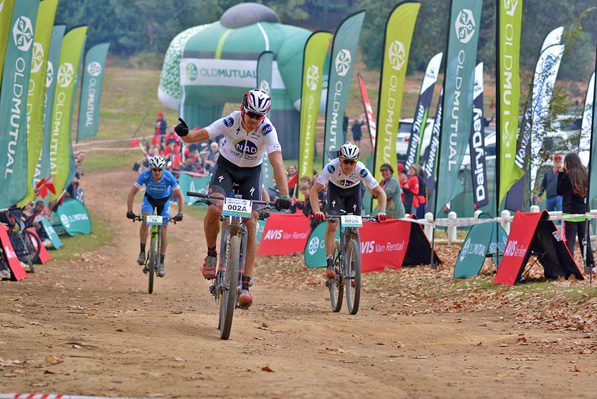 Nico Bell of NAD Pro (front) and Gawie Combrinck (right) win stage five of the 2016 Old Mutual joBerg2c between Winterton and Nottingham Road. Photo supplied.