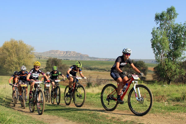 Front of picture: Danielle Strydom (17 - Swiss Cycles) won the Junior Women's race to claim the South African MTB Marathon Champion title over the 43.5-kilometre half-marathon route in a time of one hour 58 minutes and eight seconds at the third round of the Ashburton Investments National MTB Series this year, which played host to the 2016 South African Mountain Bike Marathon Championships in Clarens, on Sunday 17 April. Photo: supplied