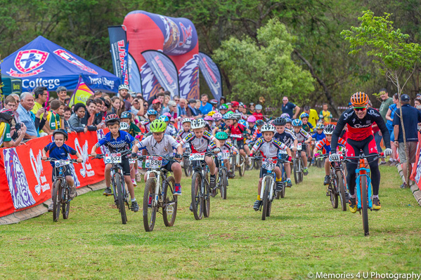 Olympic rider James Reid of Team Spur leading out the young nippers at the Mpumalanga finals of the Spur Schools MTB League. Photo: Bev Corser