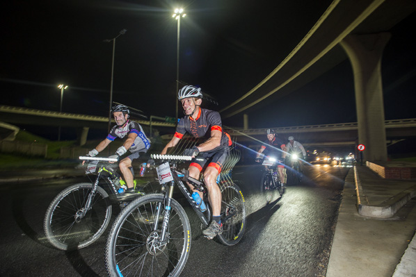 Former Dusi Canoe Marathon winner Martin Dreyer (left) and Craig Greenland (right) charge through the dark during the early stages of the uBhejane Xtreme MTB Challenge on Saturday, 10 December. Photo: Anthony Grote/Gameplan Media