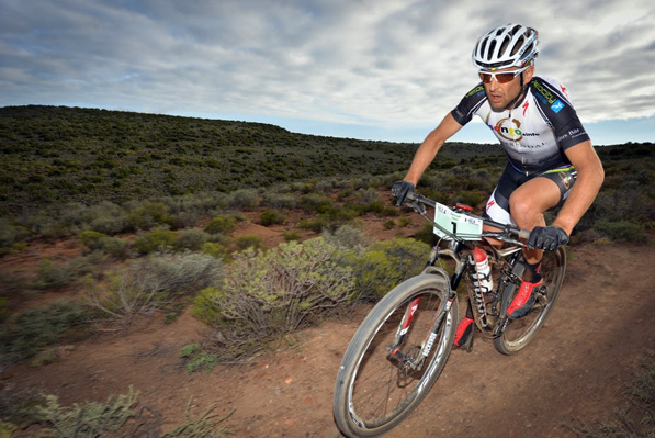 Two-time winner, Christoph Sauser, pictured here on his way to second place in 2014, will be using Saturday’s Fairview Attakwas Extreme MTB Challenge as his first major preparation race in his quest for a sixth Cape Epic title. Photo: www.zcmc.co.za